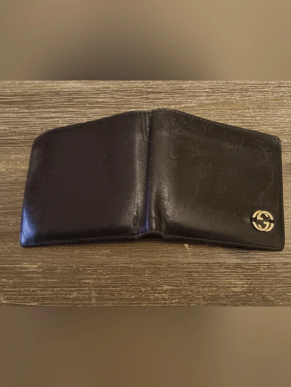 Gucci Black Leather Bifold Wallet with Silver GG Accent